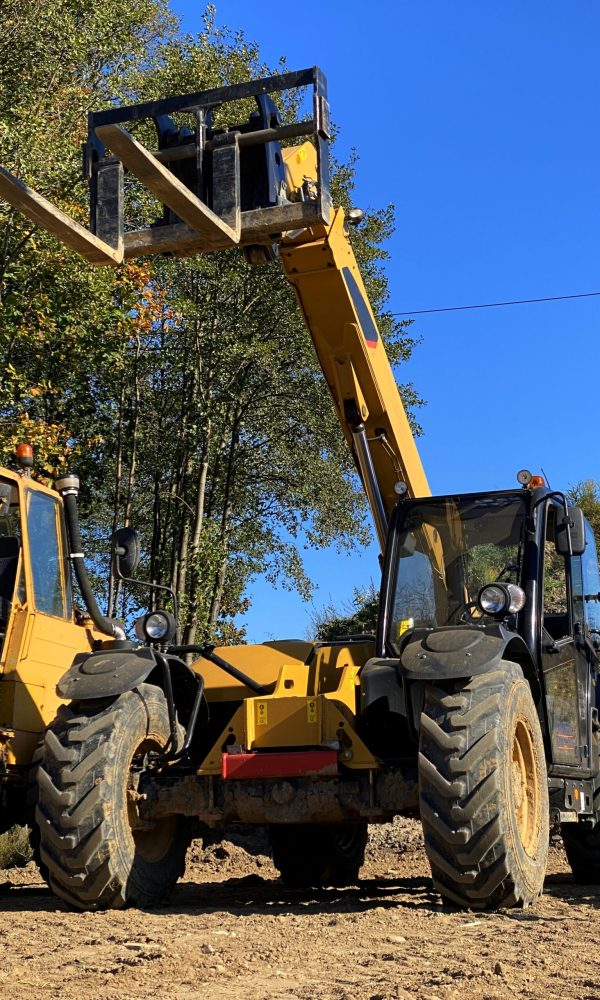 The forklift outdoors in the construction area on a sunny day