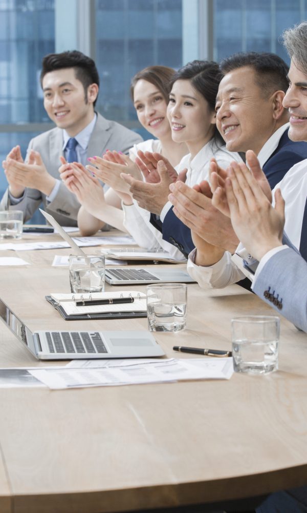 Business people having meeting in board room